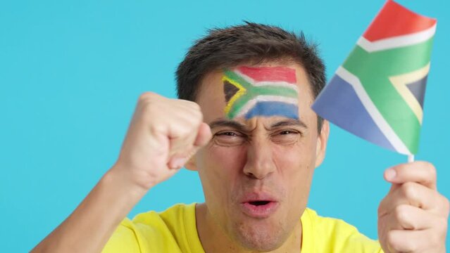 Close up of a man supporting south african team