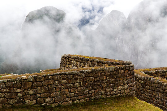 Inca Stone Walls Clouds Mountains And Grass Machu Picchu