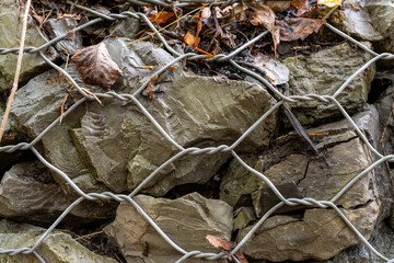 Retaining wall gabion baskets, Gabion wall caged stones textured background