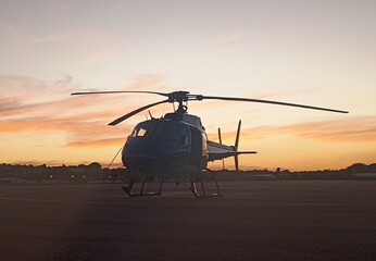 helicopter at sunset