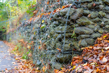 Retaining wall gabion baskets, Gabion wall caged stones textured background