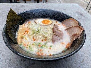 Closed up to Tonkotsu Chashumen the Japanese noodle with pork and boiled egg in white pork soup for...