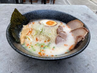 Closed up to Tonkotsu Chashumen the Japanese noodle with pork and boiled egg in white pork soup for Japanese food 