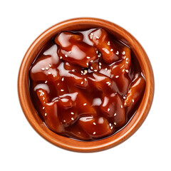 Top view of teriyaki dip in a wooden bowl isolated on a white background