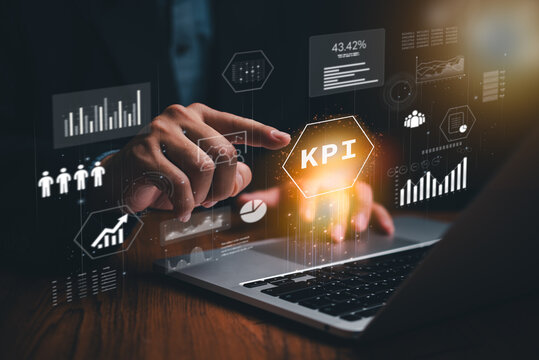 Man analyzes business finance data on laptop, investment figures digital marketing KPI and sales report. Utilizing financial management technology, an advisor navigates KPI virtual screen cyber space.