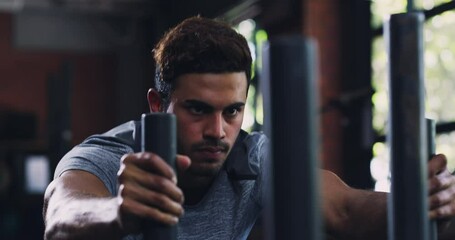 Gym, power and serious man push sled for workout, fitness or endurance challenge, resilience or active performance. Determined, hard work and strong person training, discipline or body building