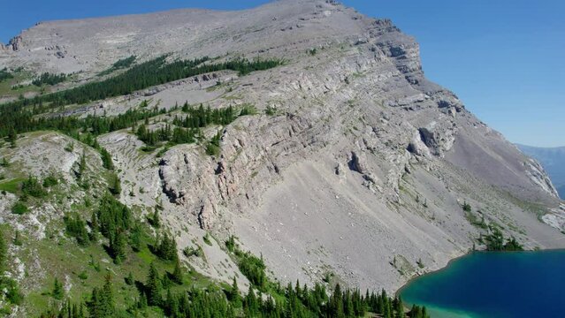Aerial Lifting Shot of Mount Strachan at Carnarvon Lake, Kananaskis, Alberta, Canada