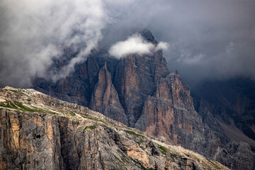 Close up on the rocks of Tofana di Rozes in summer fog in the Dolomites, Italy, Europe