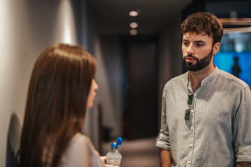 Multiracial Entrepreneurs Analyzing Market Data in Modern Downtown Office
