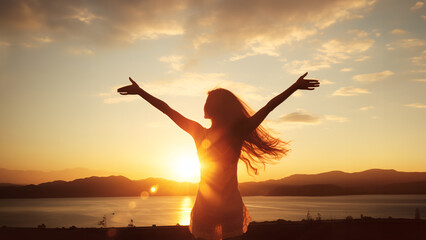 Fototapeta premium silhouette of person jumping on sunset