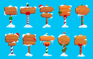 Christmas cartoon wooden signs, north pole and holiday sign boards. Vector set of wood street banners with snow caps, ice and icicles. Decorated Xmas winter pointers, banners, guideposts or billboards - obrazy, fototapety, plakaty