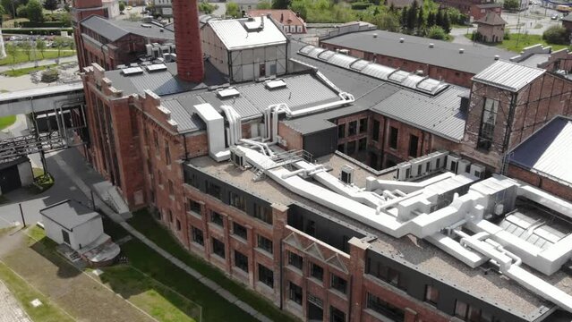Aerial tilt-up shot of the Cukrownia Znin, Poland.