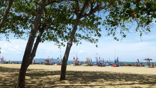 Pattaya beachfront filled with local vendors' food stalls who sell street food to local and foreign tourist from late in the afternoon till midnight.
