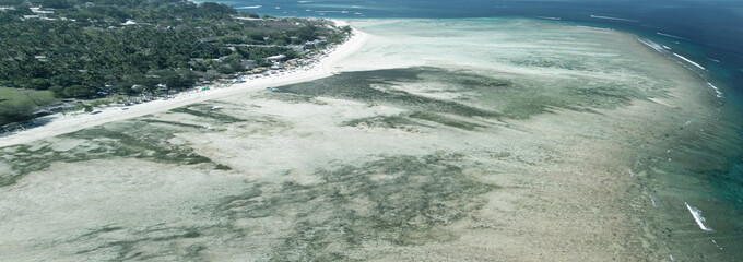 Amazing aerial view of Gili Trawangan coastline on a sunny day, Indonesia