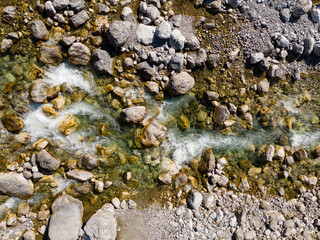 Birds eye perspective of a river in the Albanian Alps