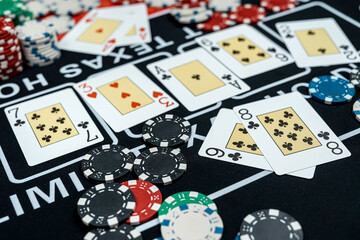 Poker hight combination with play card and chips on casino club