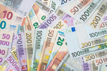 Flat lay of euros banknotes, lot of EU money.