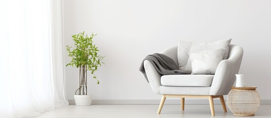 Bright living room with grey armchair and white blanket on coffee table With copyspace for text
