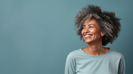 Happy mature confident African American woman smiling. - obrazy, fototapety, plakaty
