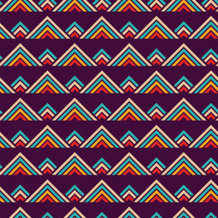 Seamless vector geometric pattern. Geometric striped triangular shapes ornament. Triangles ethnic pattern. Stylish texture. Vector color ethnic background.