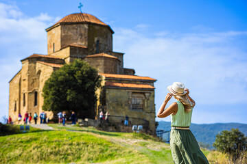 Tourist walk to the Jvari monastery in Georgia, Mtskheta