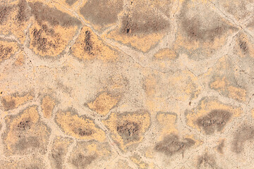 Cracked concrete wall as an abstract background. Texture