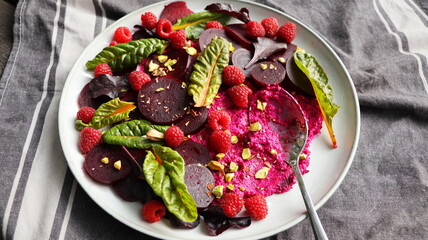 Healthy Beet Salad with raspberry, red pray, nuts