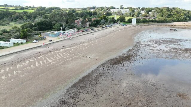 Pull back drone aerial reverse reveal beach Bembridge village Isle of wight Uk drone,aerial
