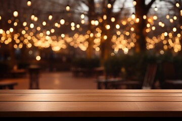 Obraz premium The empty wooden table top with blur background. Gold bokeh
