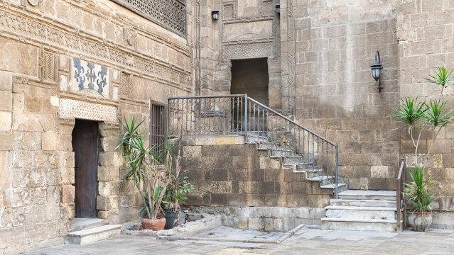 Courtyard of 14th century Prince Taz Palace in Cairo, Egypt, with staircase leading to the first floor, built by Mamluk Prince Saif Eddin Taz