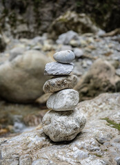 Stacked zen stones in Cheile Oltetului gorge