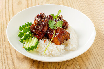 Rice topped with teriyaki sauce  and vegetables
