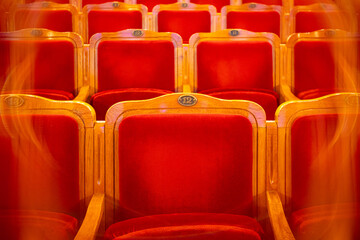 Obraz premium Row of red seats in theatre