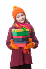Winsome Smiling Caucasian Girl With Heap of Gift Boxes Posing in Winter Outfit Against Pure White