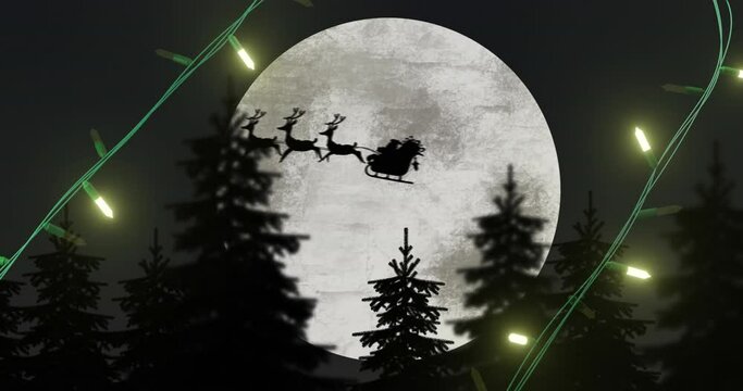 Yellow christmas string lights flashing over trees and santa passing full moon in sleigh