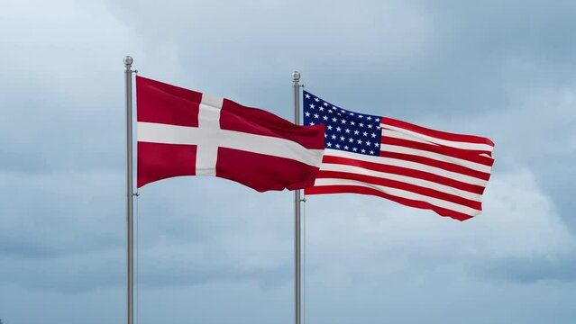 USA and Denmark flag waving together on cloudy sky, endless seamless loop, two country cooperation concept