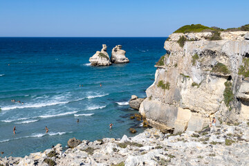 TORRE DELL'ORSO, ITALY, JULY 14, 2022 - View of the beach called of the Two Sisters in the village...