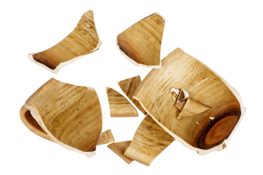 Broken brown clay cup isolated on a white background