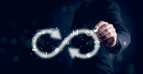 Business people hold Infinity symbol with technology global marketing online in business connection...