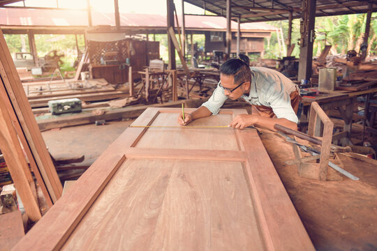 Carpenter working in a workshop, Thailand