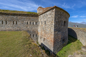 Fototapeta premium MONT-CENIS, FRANCE AUGUST 18, 2023 - View of Ronce Fort on the Mont-Cenis lake between the Italian Val di Susa and the French Maurienne valley, France