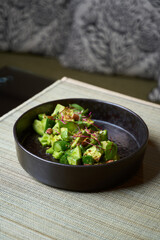 Avocado salad with fresh cucumber almond