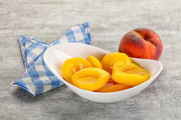 Ripe sweet and juicy canned peach