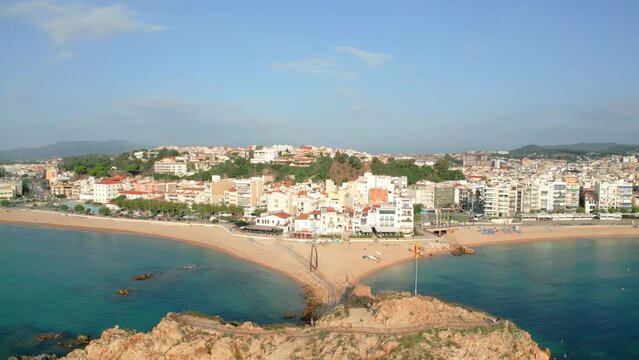 Mediterranean fishing city aerial images of the main beach European tourism Blanes Costa Brava