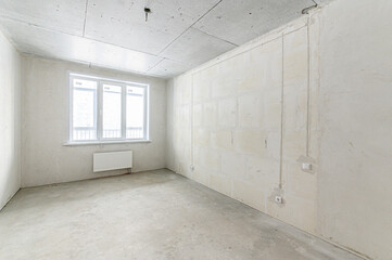 rough repairs for self-finishing. interior decoration, bare walls of the room, stage of construction