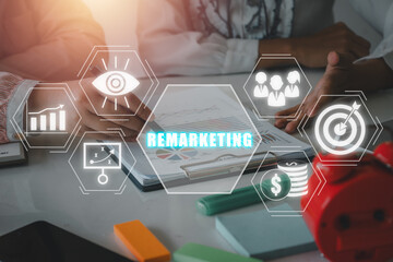 Remarketing concept, Business team analyzing income charts and graphs with remarketing icon on...