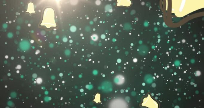 Animation of christmas bell icons falling against spots of light on blue background with copy space