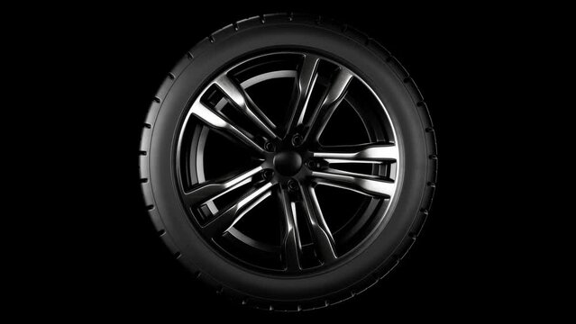 Spinning car wheel. Black rubber automotive tire. Auto service concept, changing wheels. Loop animation.
