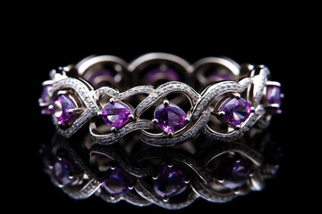 white gold ring with purple gems