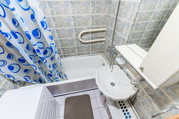 interior apartment room bathroom, sink, decorative elements, toilet